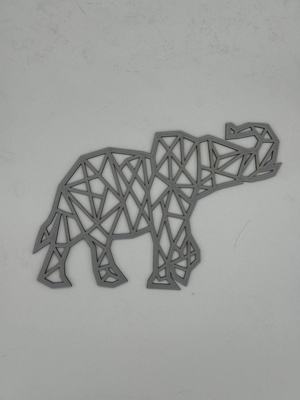 Geometric line laser-cut wood elephant wall art by MacPack3D