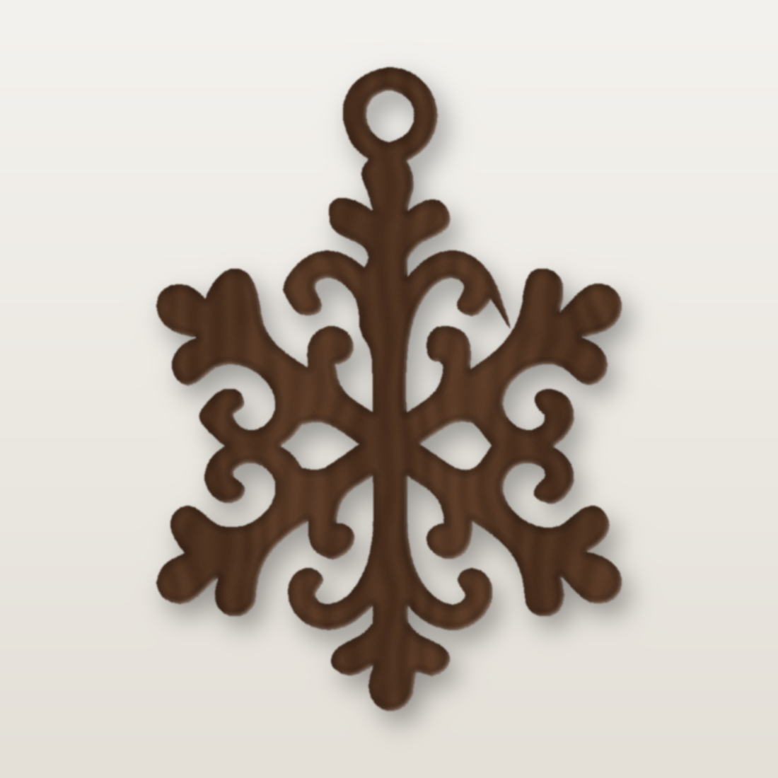Laser-cut snowflake ornament in walnut by MacPack3D
